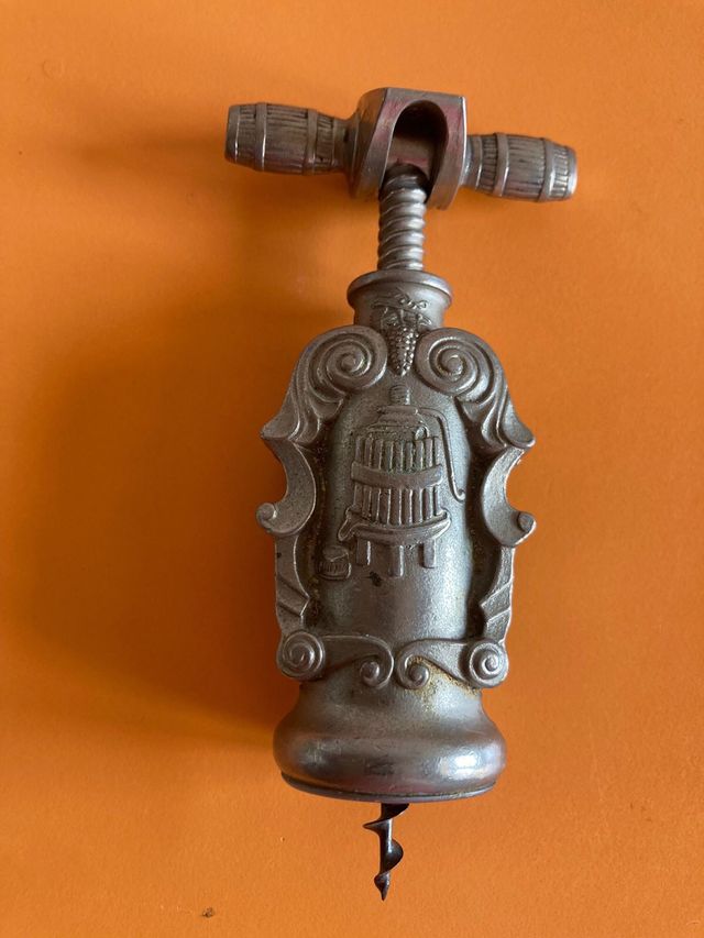 Apribottiglie metallo vintage