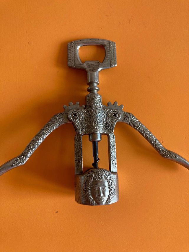 Apribottiglie metallo vintage