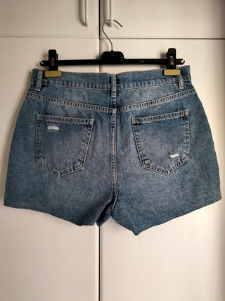 Short denim cintura asimétrica