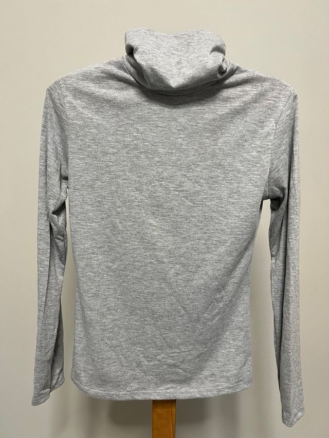 Blusa de cuello alto