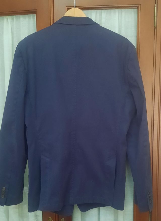 Americana azul marino talla 50-52.