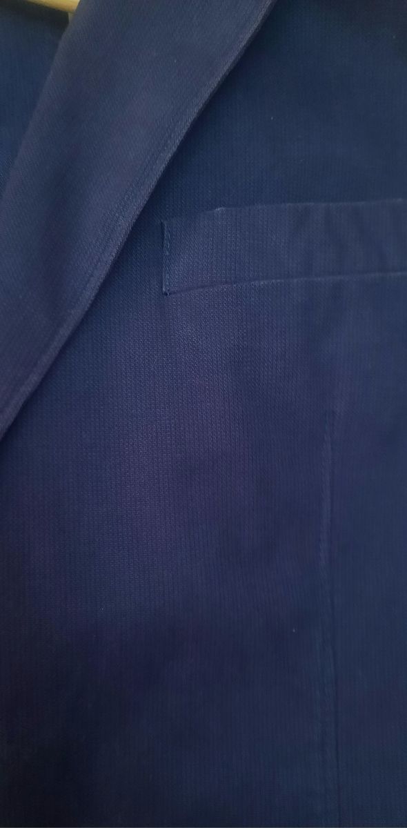 Americana azul marino talla 50-52.