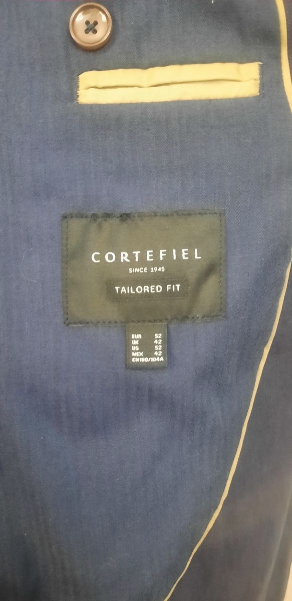 Americana azul marino talla 50-52.