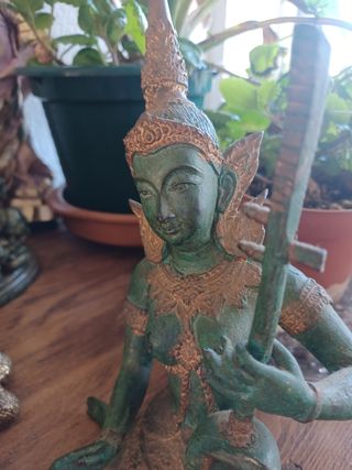 Músicos tailandeses de bronce