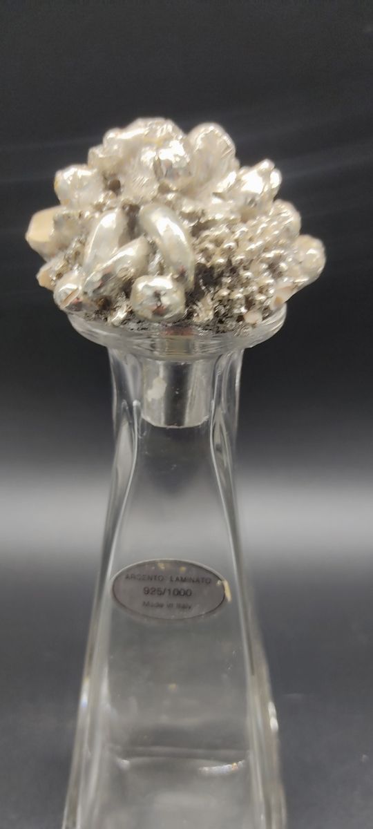 Tre bottiglie argento 925