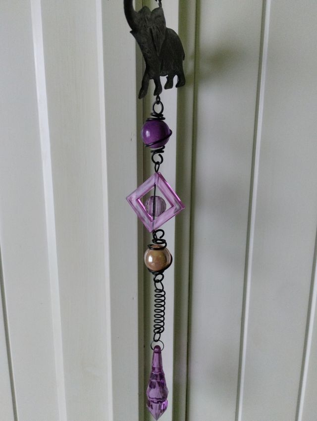 Colgante para puertas o cortinas