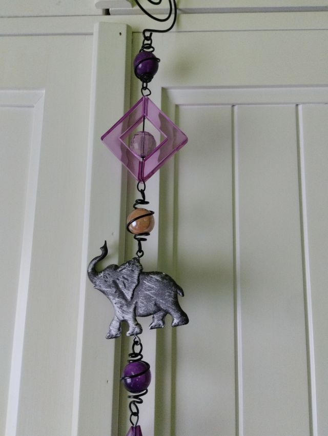 Colgante para puertas o cortinas