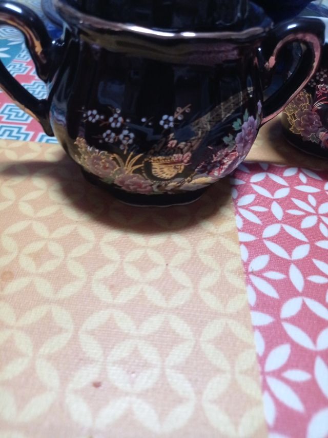 Juego de café pavo real