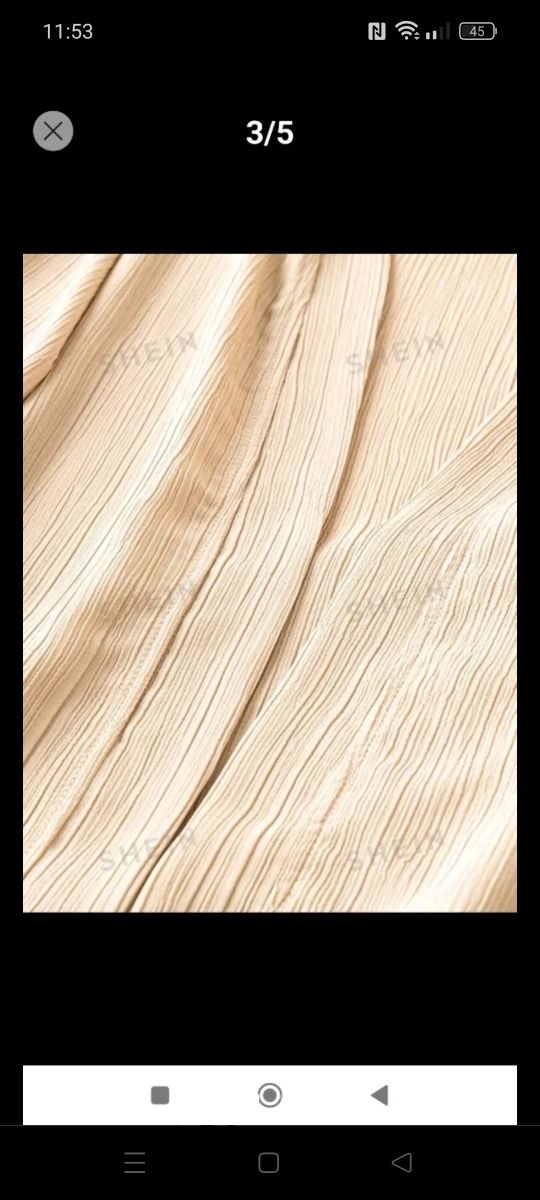 Conjunto beige chaqueta y pantalón