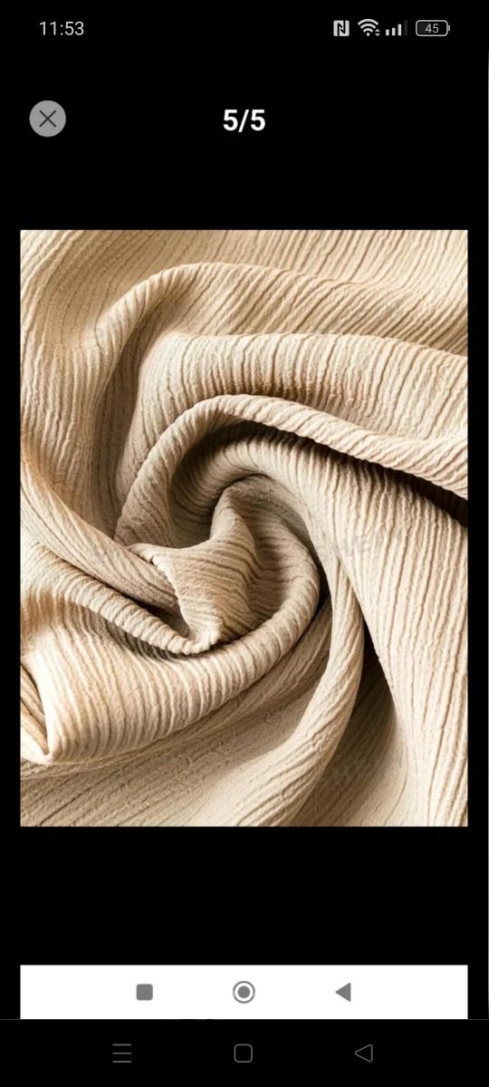 Conjunto beige chaqueta y pantalón