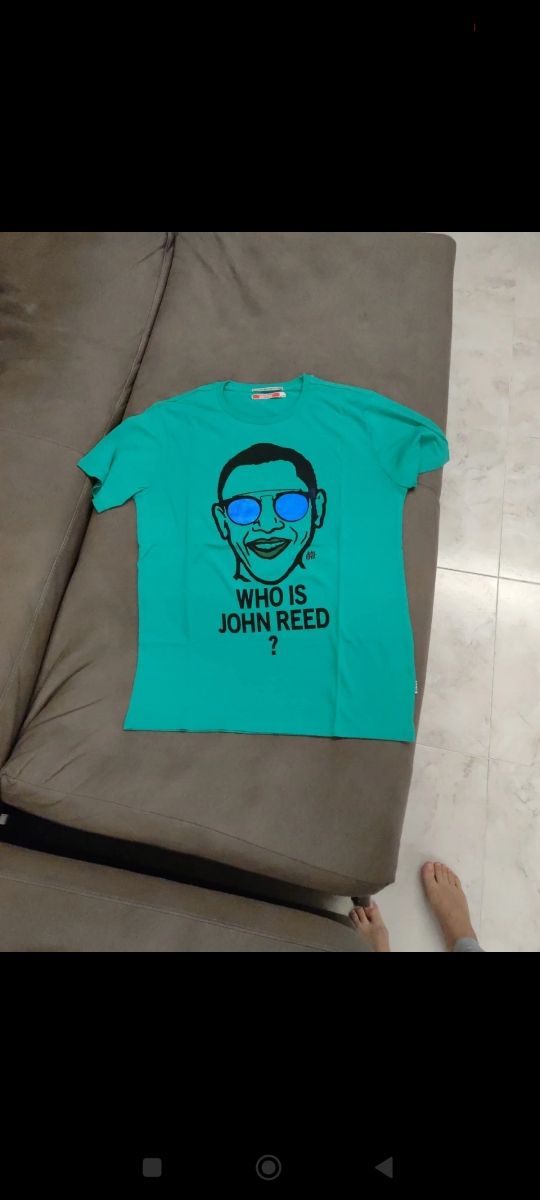 T-shirt verde taglia M mai usata 