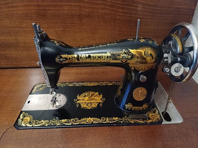 Maquina coser Singer mueble castellano