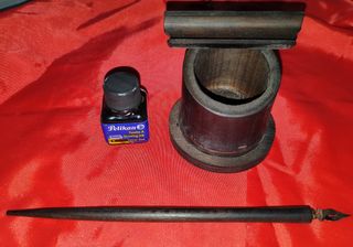 Antiguo escribidor de tinta tipo pluma