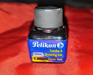 Antiguo escribidor de tinta tipo pluma