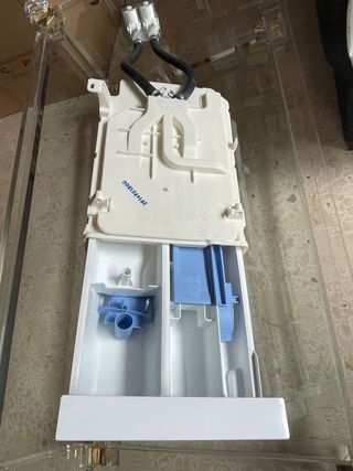 Compartimento, cajetin detergente y tomas agua