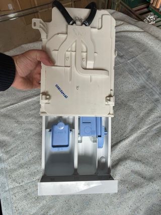Compartimento, cajetin detergente y tomas agua
