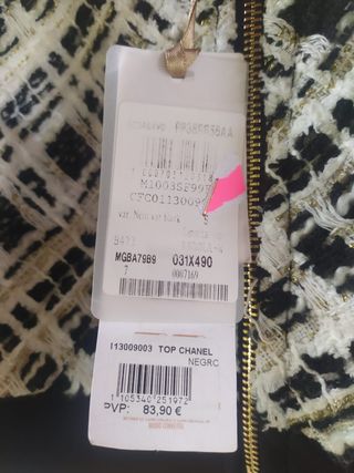 Top tipo chanel negro talla S,sin estrenar.