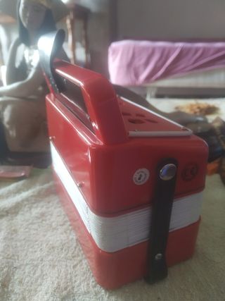 Acordeon nuevo usado dos veces