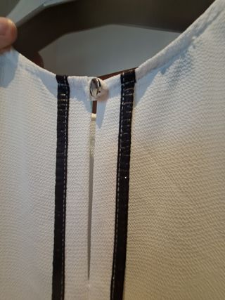 Top  bianco e argento.