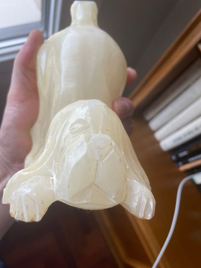 Pareja de perros de porcelana tallada