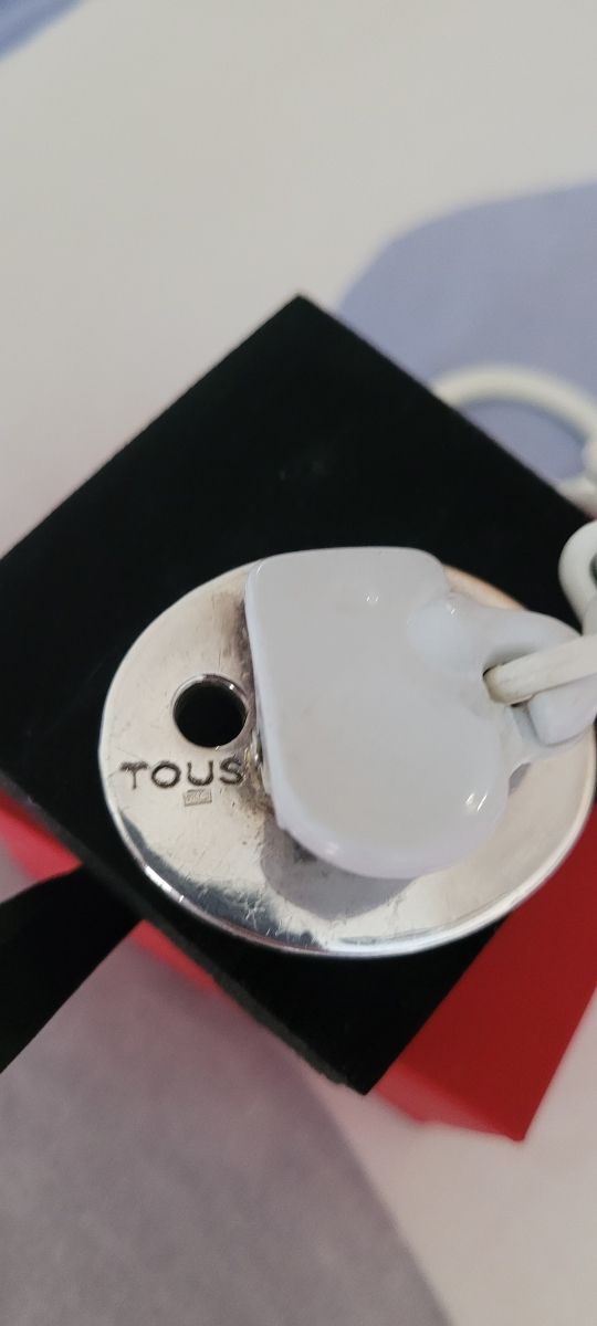 Chupetero de plata redondo de Tous.