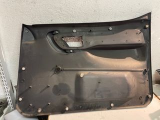 Guarnecido puerta del. iz. peugeot partner