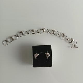 Juego de pulsera y pendientes