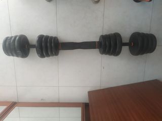 Barra de pesas y discos