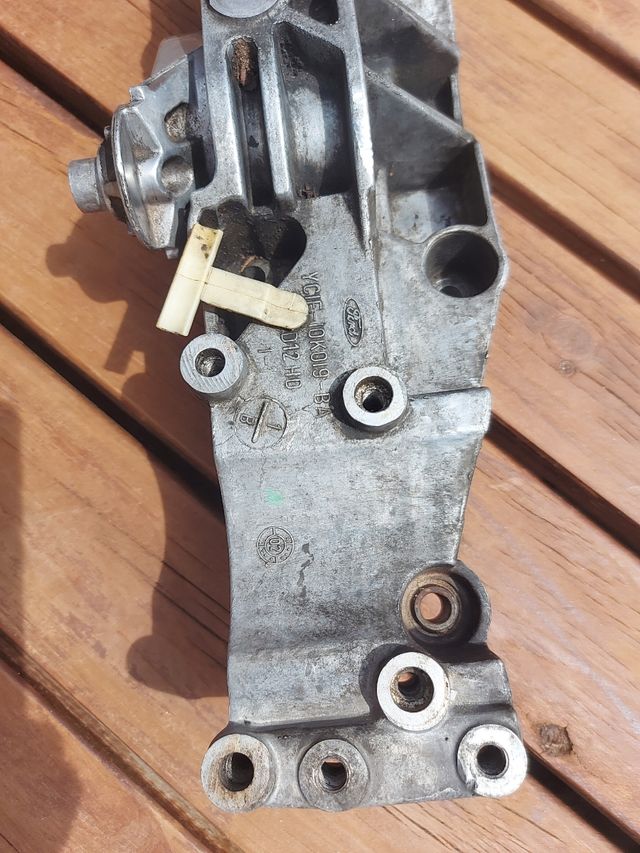 Soporte dinamo alternador Ford transit YC1E 10K019