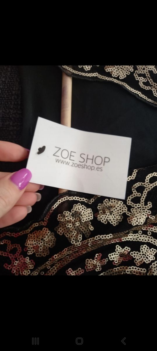 Mono pantalo corto negro y dorado