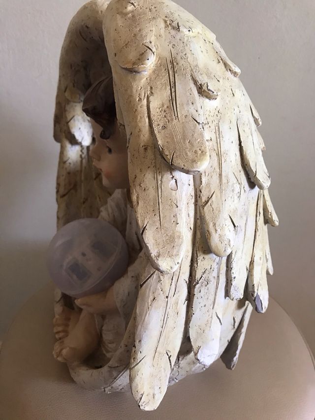 Angelo con luce solare