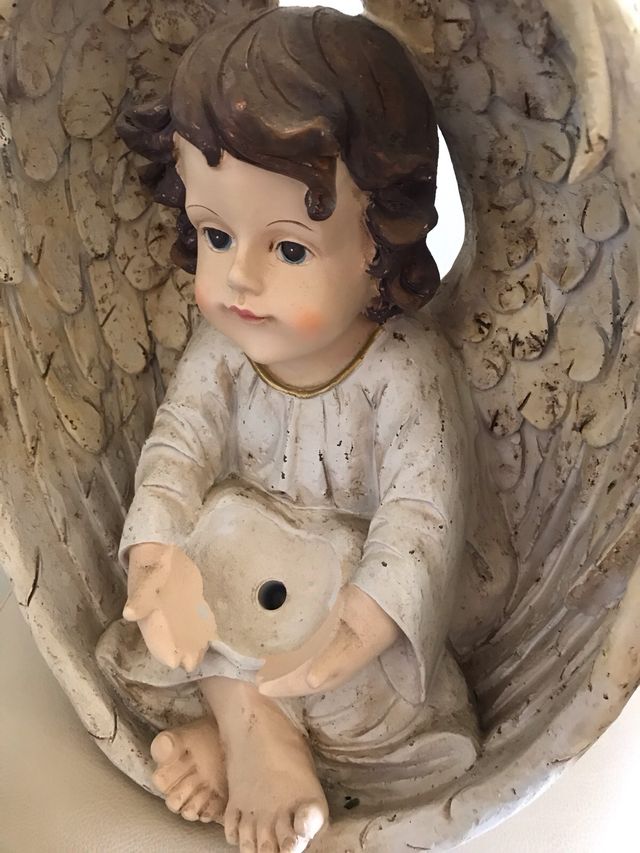 Angelo con luce solare