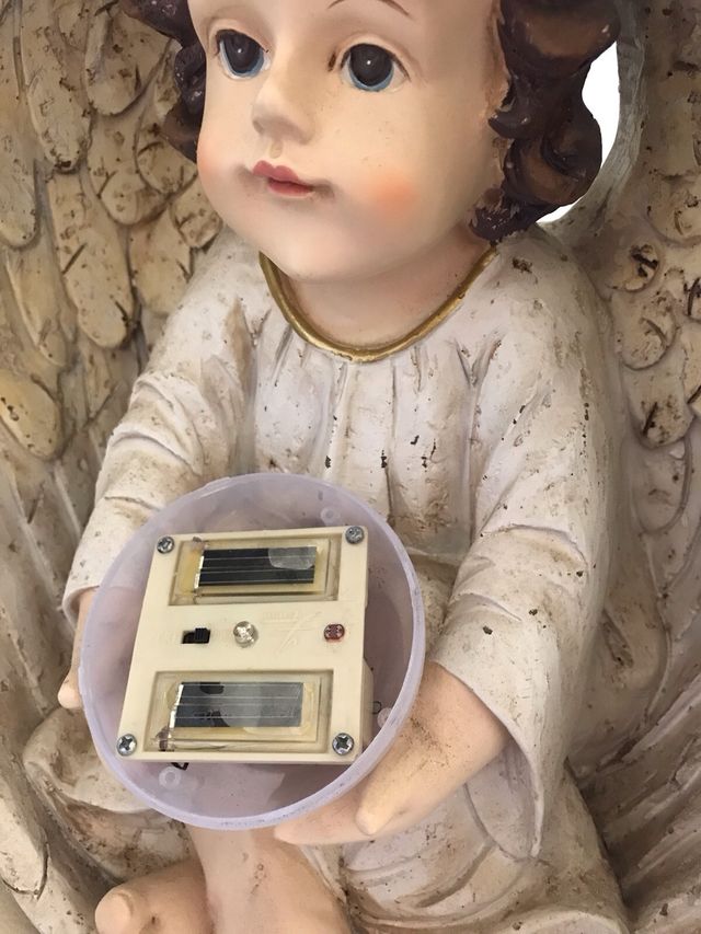 Angelo con luce solare