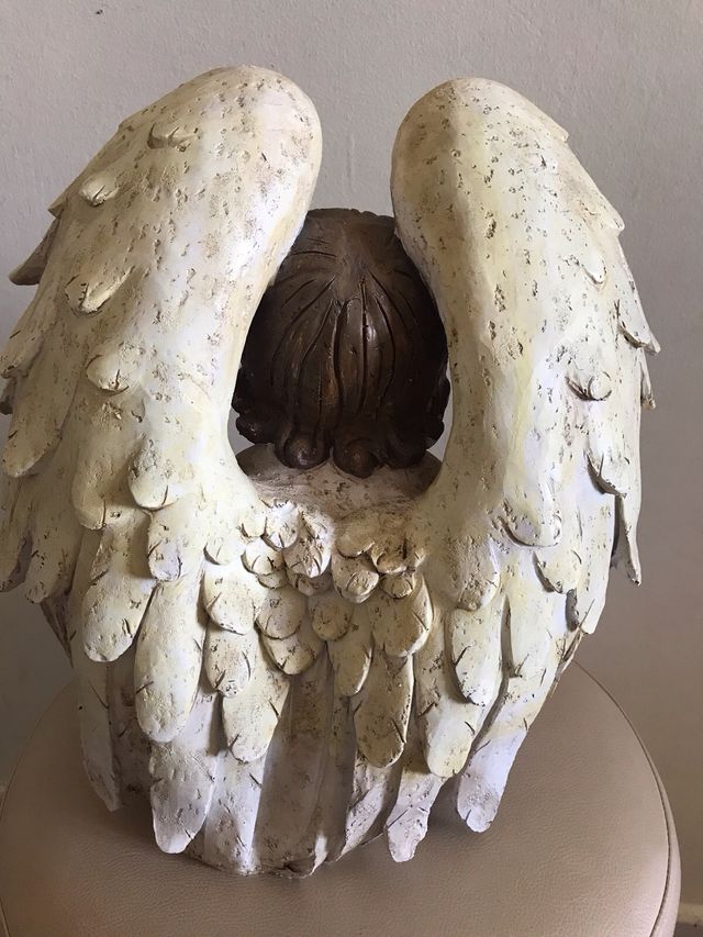 Angelo con luce solare