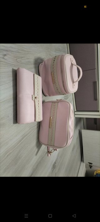 Conjunto de bolso, cambiador, nevera y neceser