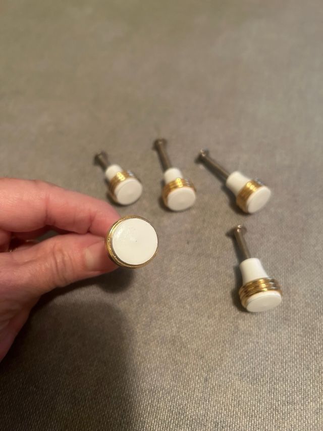 10 Pomos blancos/dorados