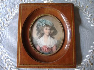 Pareja de cuadros antiguos.