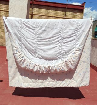 Edredón cama nido.
