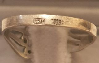 Anillo de plata con diamantes y rubi