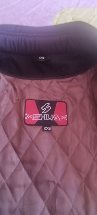 Conjunto chaqueta y guantes para moto