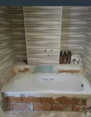 Albañil económico1 € cambio de bañera plato 490€