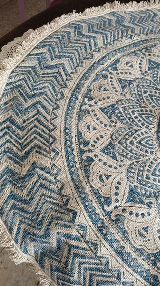 Alfombra nueva, con su etiqueta.