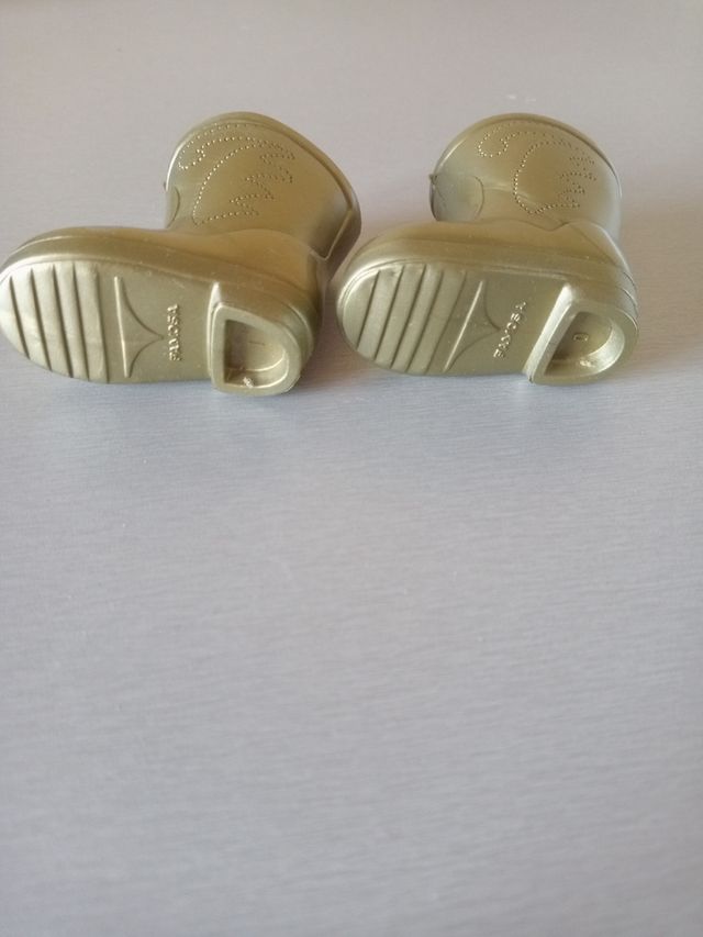 Botas doradas muñeca nancy