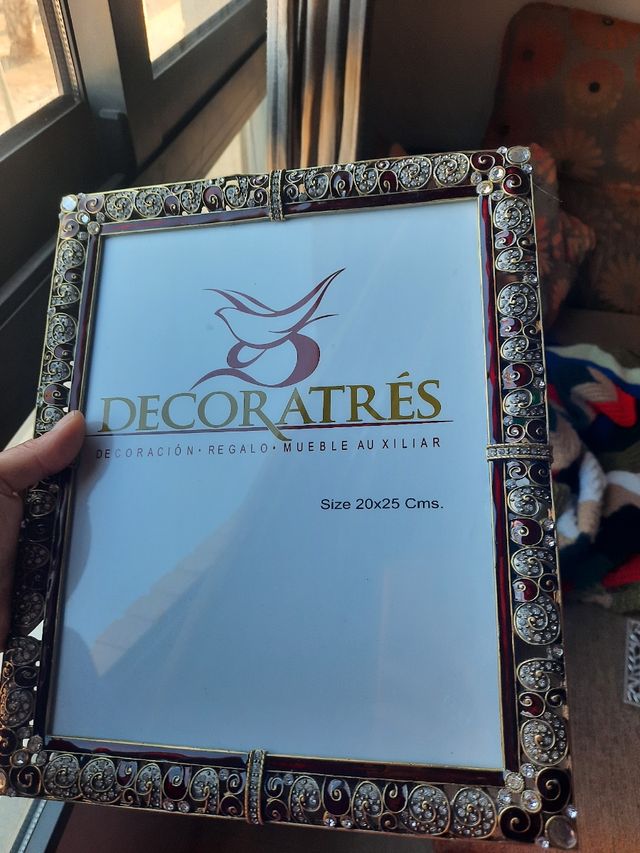 Juego de 4 portafotos.