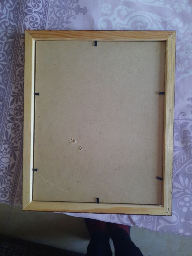 Juego de 4 portafotos.