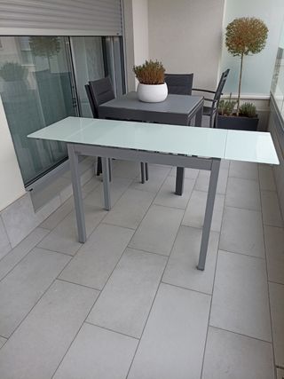 Mesa de cristal extensible