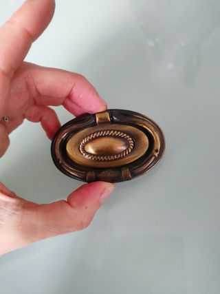 Conjunto 15 antiguos tiradores bronce repujado