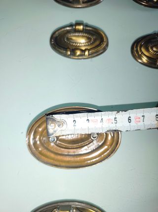 Conjunto 15 antiguos tiradores bronce repujado