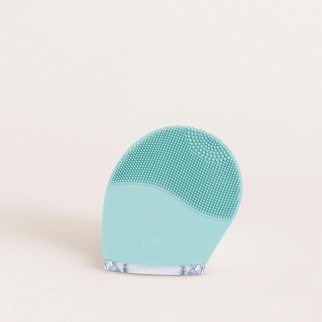 Spazzola per la pulizia del viso con luce e vibrazioni 