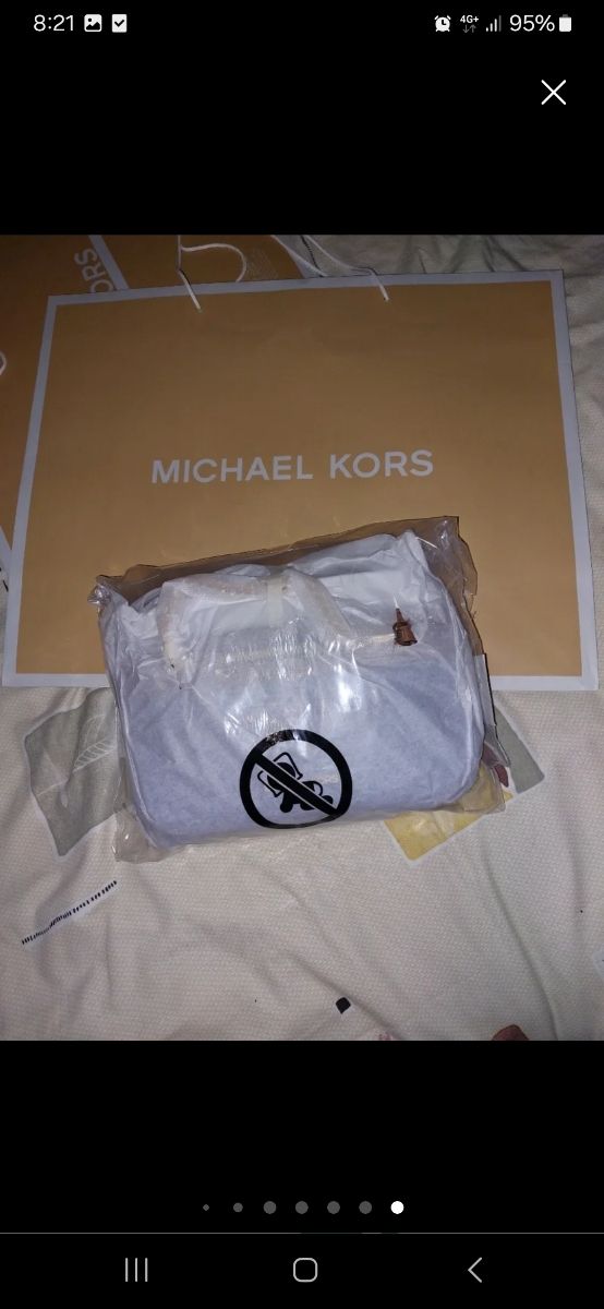 Bandolera Michael kors denim .